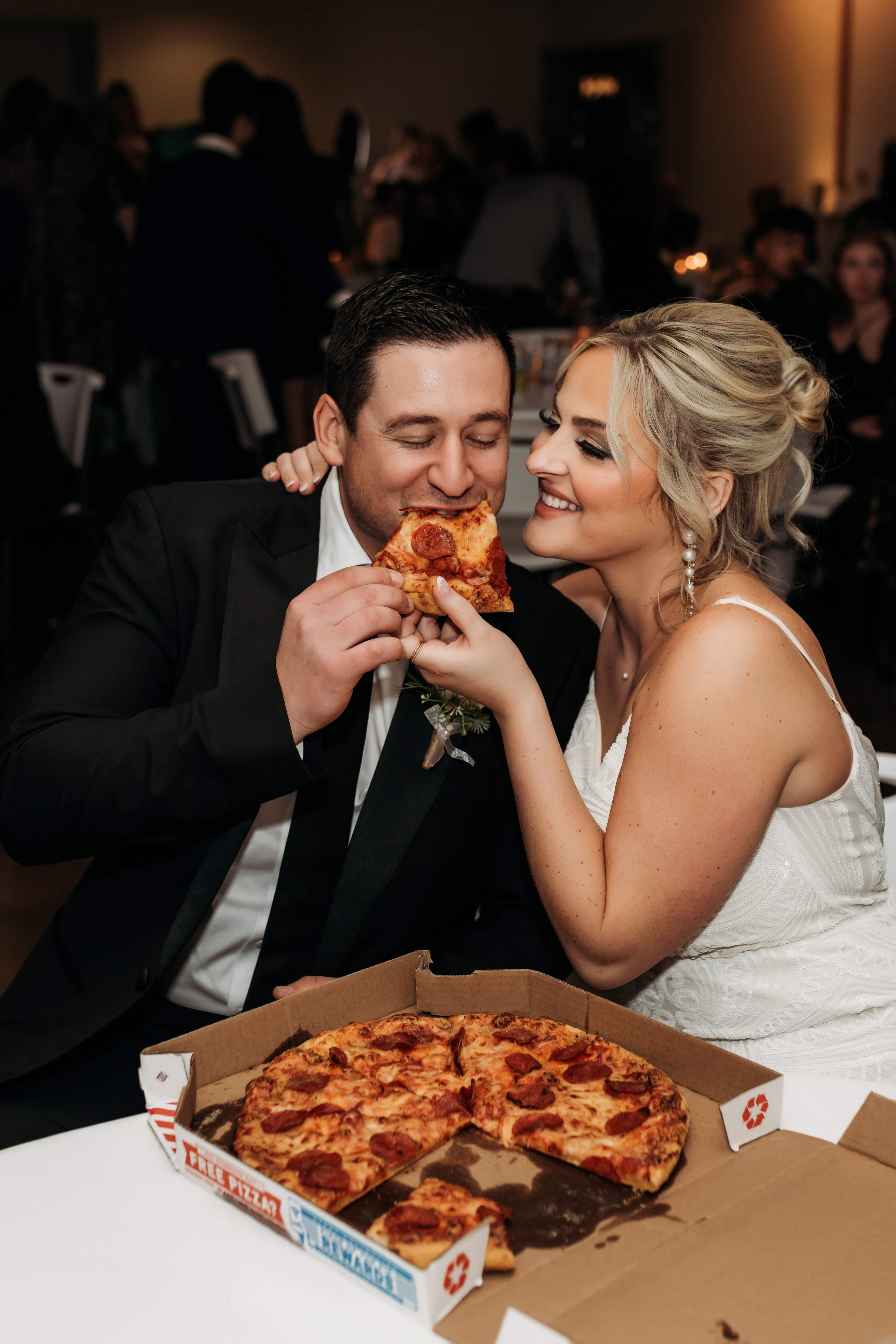 Wedding & Elopement Photography, Bride and groom sharing a pizza