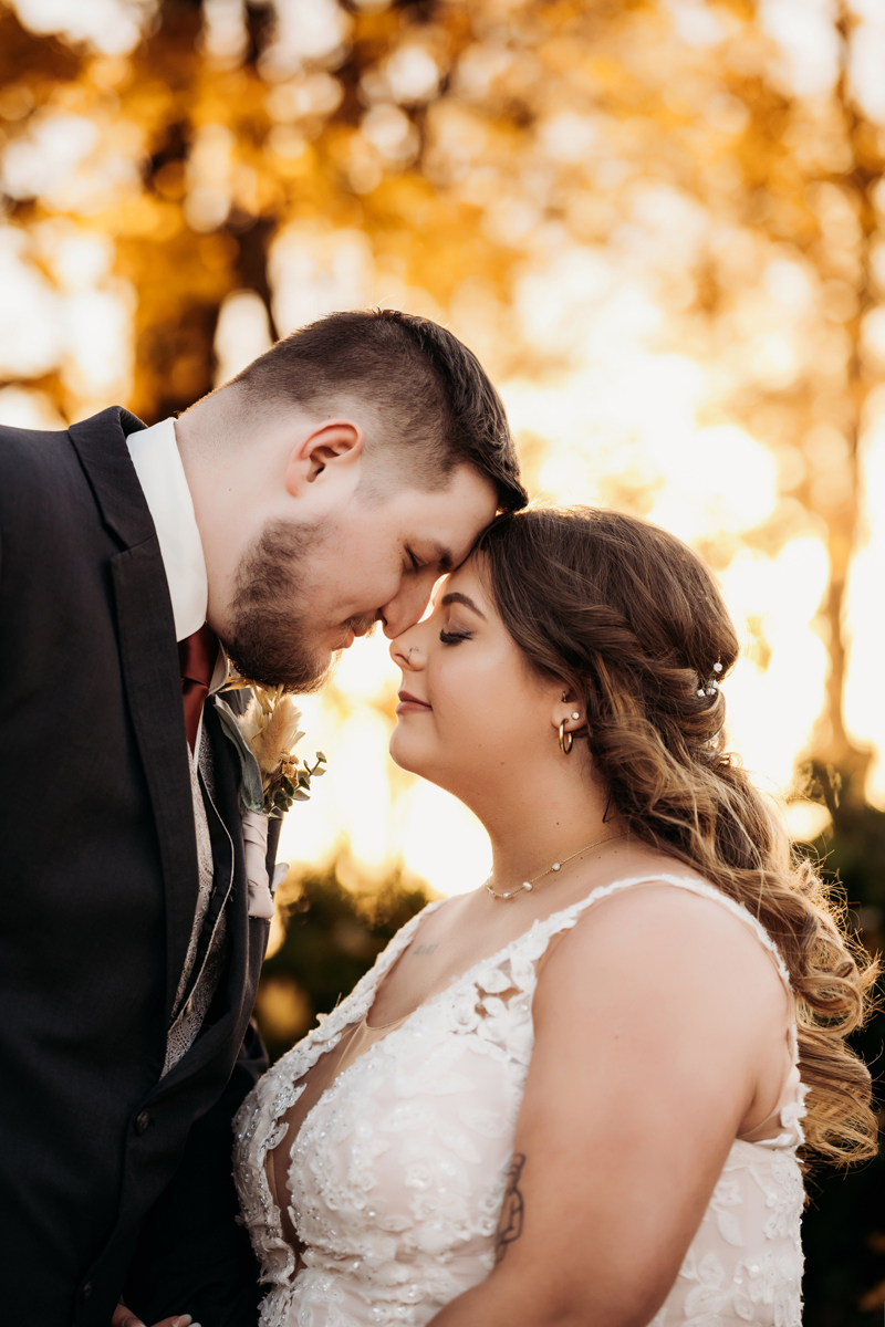 Wedding & Elopement Photography, groom resting his forehead on bride's forehead