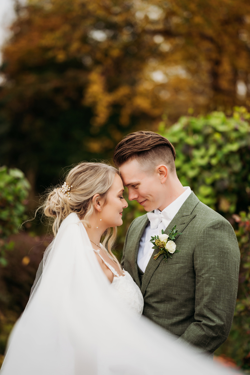 Wedding & Elopement Photography, bride and groom resting forehead to forehead