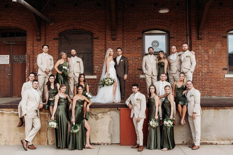 Wedding & Elopement Photography, big group shot of bridal party outside of an old warehouse